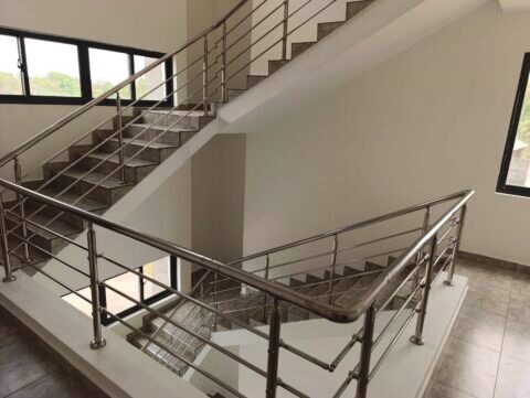 Stainless steel balustrade staircase inside a completed building